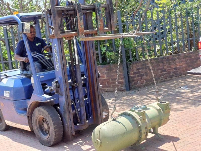 Compressor unit being transported by forklift